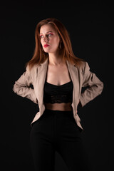 Portrait of pretty woman with red hair,