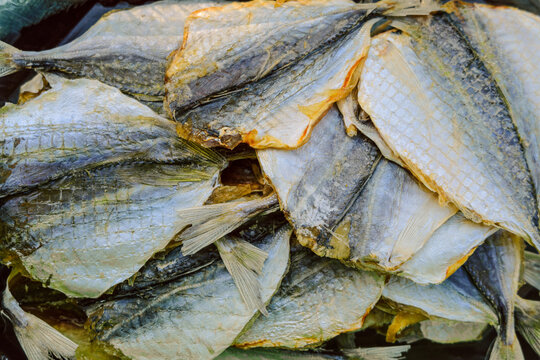 Yellow-striped selar. Dried salted fish. Salty snack.