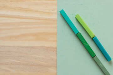 soft pastel in various hues of green and blue