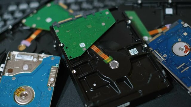 Pile of Hdd storage devices computer components.hi tech parts shortage