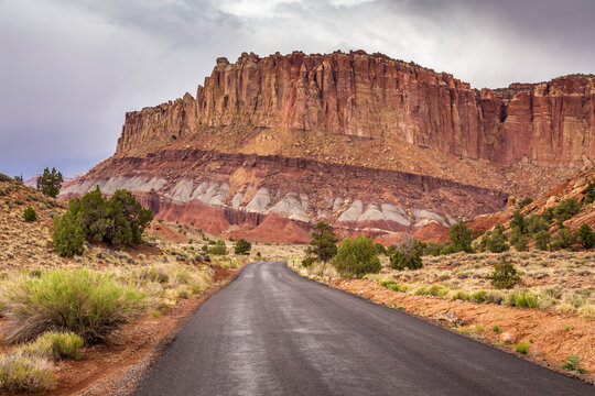 Scenic drive in the colorful desert landscape of Capitol reef national park on a stormy day in Utah.