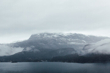 Foggy morning over the winter fjord