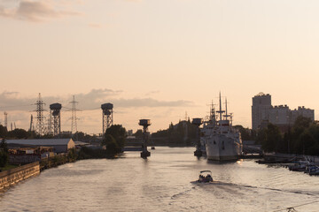 Ships at pier of Pregolya River near World Ocean Museum at sunset light, Kaliningrad, Russia