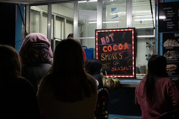 People waiting to buy at a foodtruck