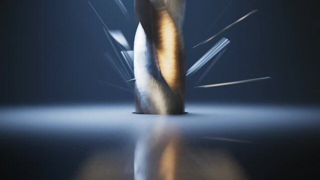 Drilling a hole in a shiny surface. Spinning drill beet among metal shavings.