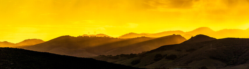 Obraz premium Panorama of Mountains, sunrise, sunset, yellow