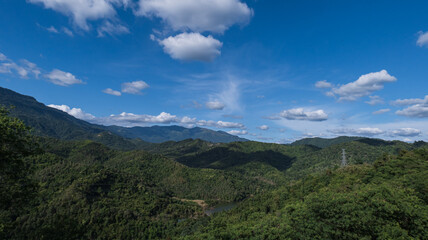 Fototapeta na wymiar Landscape green mountains and beautiful sky clouds under the blue sky
