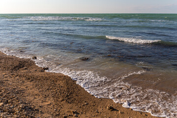 Sea shore with surf