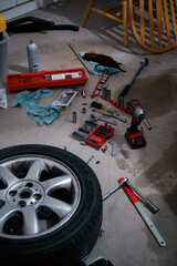 Mechanic Floor Tools in Garage and Wheel Impact Drill