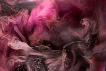 Pink smoke on black ink background, colorful fog, abstract swirling touch ocean sea, acrylic paint pigment underwater © amixstudio