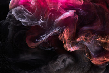 Pink smoke on black ink background, colorful fog, abstract swirling touch ocean sea, acrylic paint pigment underwater © amixstudio