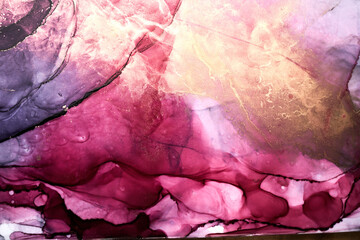 Fototapeta premium Luxury abstract dark background in alcohol ink technique, pink gold liquid painting, scattered acrylic blobs and swirling stains, printed materials