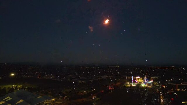 AERIAL: Firecrackers at a Local Carnival Fair During Night in Melbourne Australia