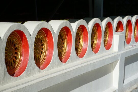 Golden Buddhist Symbol. Dharmachak or wheel of Dharma - Powered by Adobe