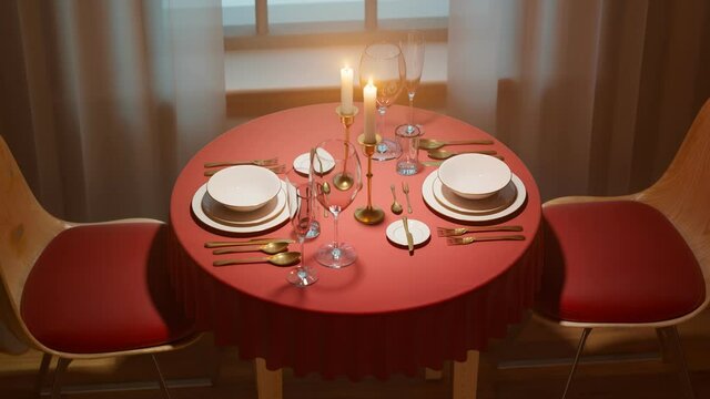 Table set up for romantic anniversary date. Empty plates and silverware on table