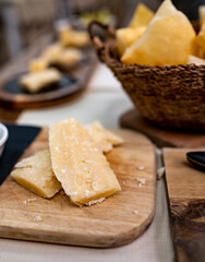 Tasting of different matured and old parmesan Parmigiano-Reggiano hard cheese in Parma, Emilia Romagna, Italy