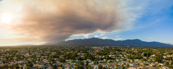 Sunny aerial view of big smoke cause by wildfire over Arcadia area