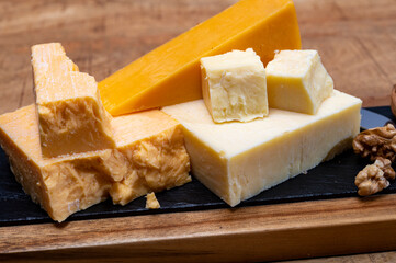 British cheeses collection, Scottish coloured and English matured cheddar cheeses
