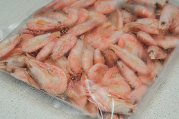 frozen shrimp in plastic packaging