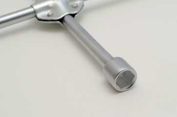 car key for repairing wheels on a white background