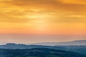 Fototapeta premium Sunrise over Worcestershire countryside,fron the Malvern Hills,England,United Kingdom.