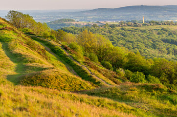 Malvern Hills at sunrise with Eastnor Obelisk in the distance,Herefordshire,England,United Kingdom.ss