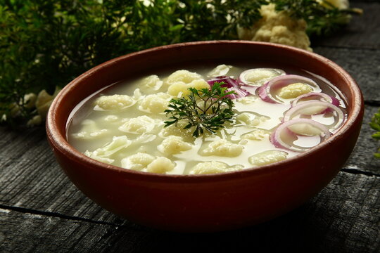 Homemade Delicious Cauliflower Vegetable Soup Cooked In Earthenware., Traditional Recipes Background.