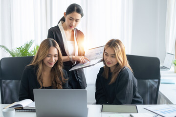 Business woman or accountant making working audit with her team. finance and accounting and Teanwork audit tax concept.