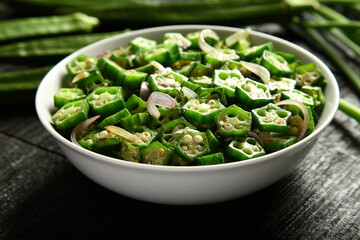 Okra stir fry- vendakka mezhukkupuratti - a traditional vegetarian dish from India.