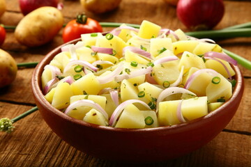 Bowl of potato salad - homemade delicious vegan diet meal.