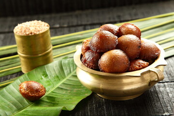 Unniyappam, a traditional delicious sweet snack fried in coconut oil . Kerala recipes.