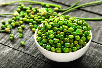 Bowl of  delicious vegan diet snack food- roasted green peas. 