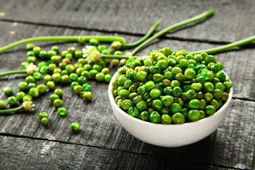 Bowl of  delicious vegan diet snack food- roasted green peas. 