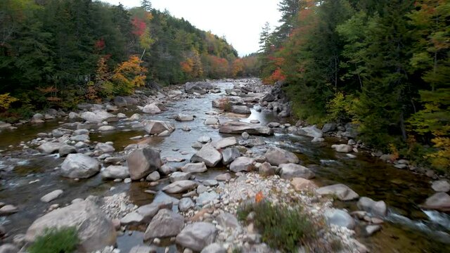 New Hampshire Drone video kancamagus highway swift river with changing leaves
