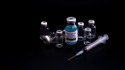 vaccine, vaccine against covid 19, syringe, black background