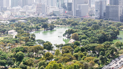 Naklejka premium Wonderful cityscape at Lumphini Park, Park is a park in Bangkok, Thailand.