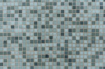 Blue mosaic tiles for bathroom or swimming pool. Ceramic square decorative tile. Abstract texture background.
