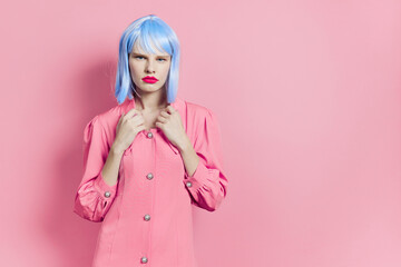 female in blue wig pink dress red lips Lifestyle posing