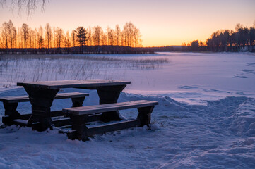beautiful Swedish sunrise over a lake or a small town

