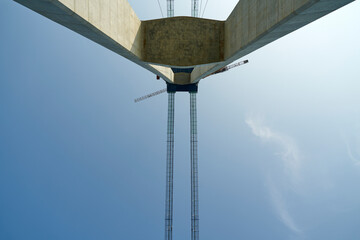 Construction of a bridge across the sea. 
대교 건설, 현수교, 주탑, 케이블, 캣워크