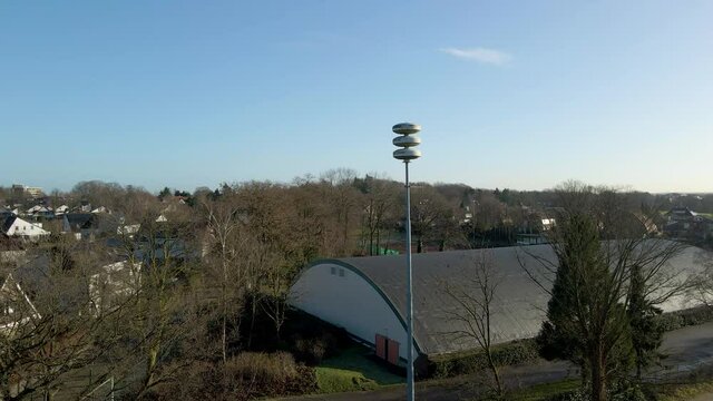 Slowly moving towards Dutch air raid siren in the Netherlands - wide