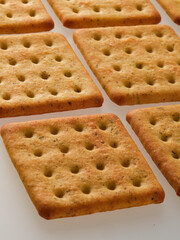 Dry cracker cookies isolated on white background, concept of food