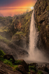 beautiful Australian waterfalls at sunset central australia.