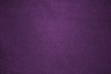 Dark purple woven fabric cloth with seamless rough grunge texture for background