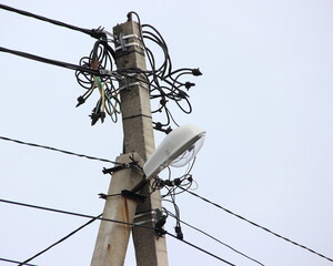 Street lighting lamppost. Technical structure. Installation work in the energy sector.