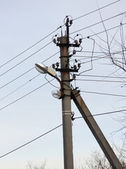 Street lighting lamppost. Technical structure. Installation work in the energy sector.