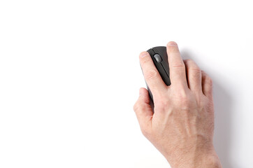 A computer mouse in a man's hand. White background.