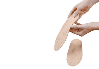 Orthopedic insole isolated on a white background. Medical insoles. Treatment and prevention of flat feet and foot diseases. Foot care, feet comfort. Wear comfortable shoes. Flat Feet Correction.
