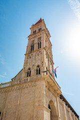 View of cathedral of St Lawrence, Trogir - Croatia. Down to up look to beautiful ancient church tower.