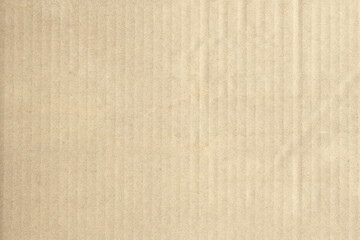 Brown cardboard background. The old paper for recycling. Carton texture. Art and craft concept....